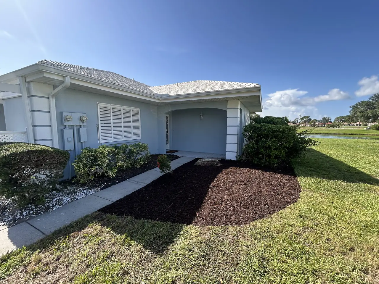 Fresh mulch bed by the front walk